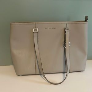 Michael Kors silver tote bag with laptop sleeve